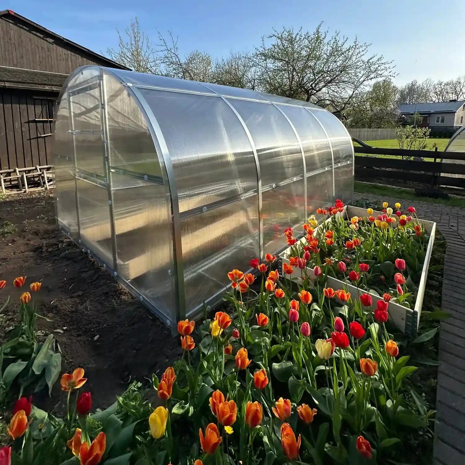 Bac de culture en bois pour serre de jardin en polycarbonate AtmoSerre