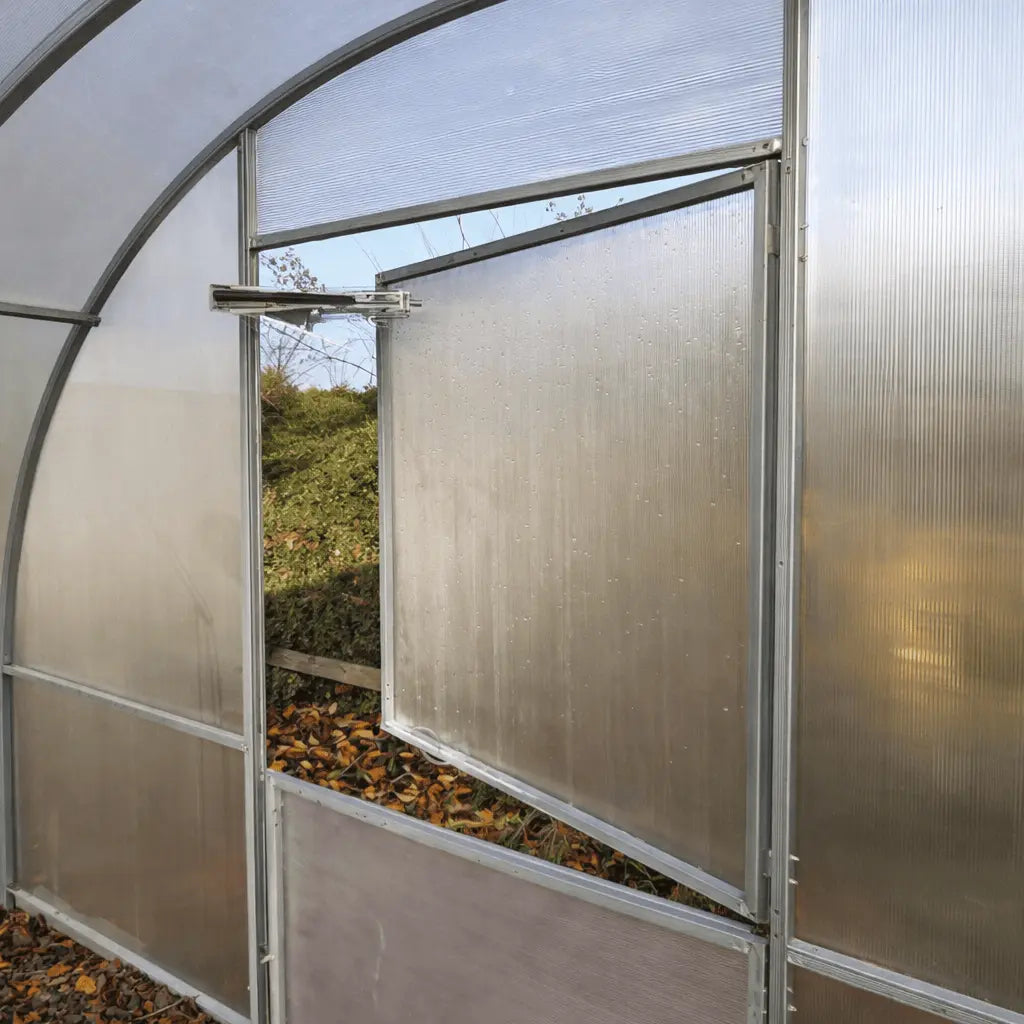 Système d’ouverture automatique pour portes et fenêtres de serre de jardin en polycarbonate AtmoSerre