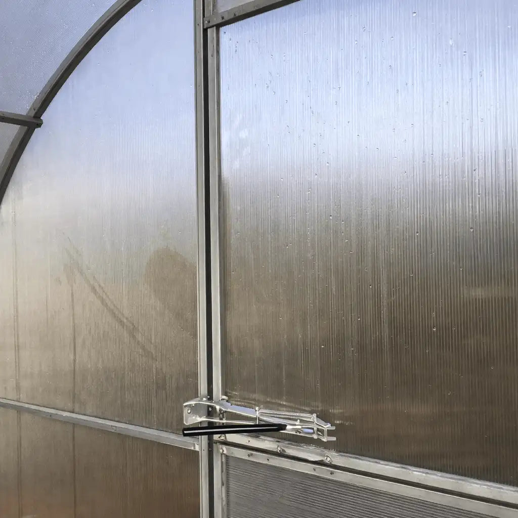 Système d’ouverture automatique pour portes et fenêtres de serre de jardin en polycarbonate AtmoSerre